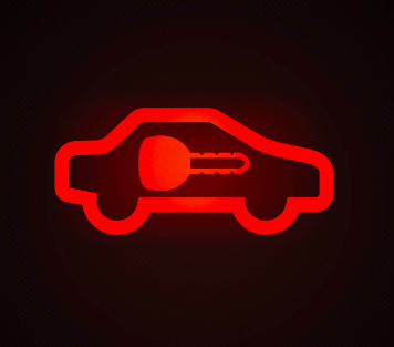 Understanding the Red Car with Key Symbol on Dashboard